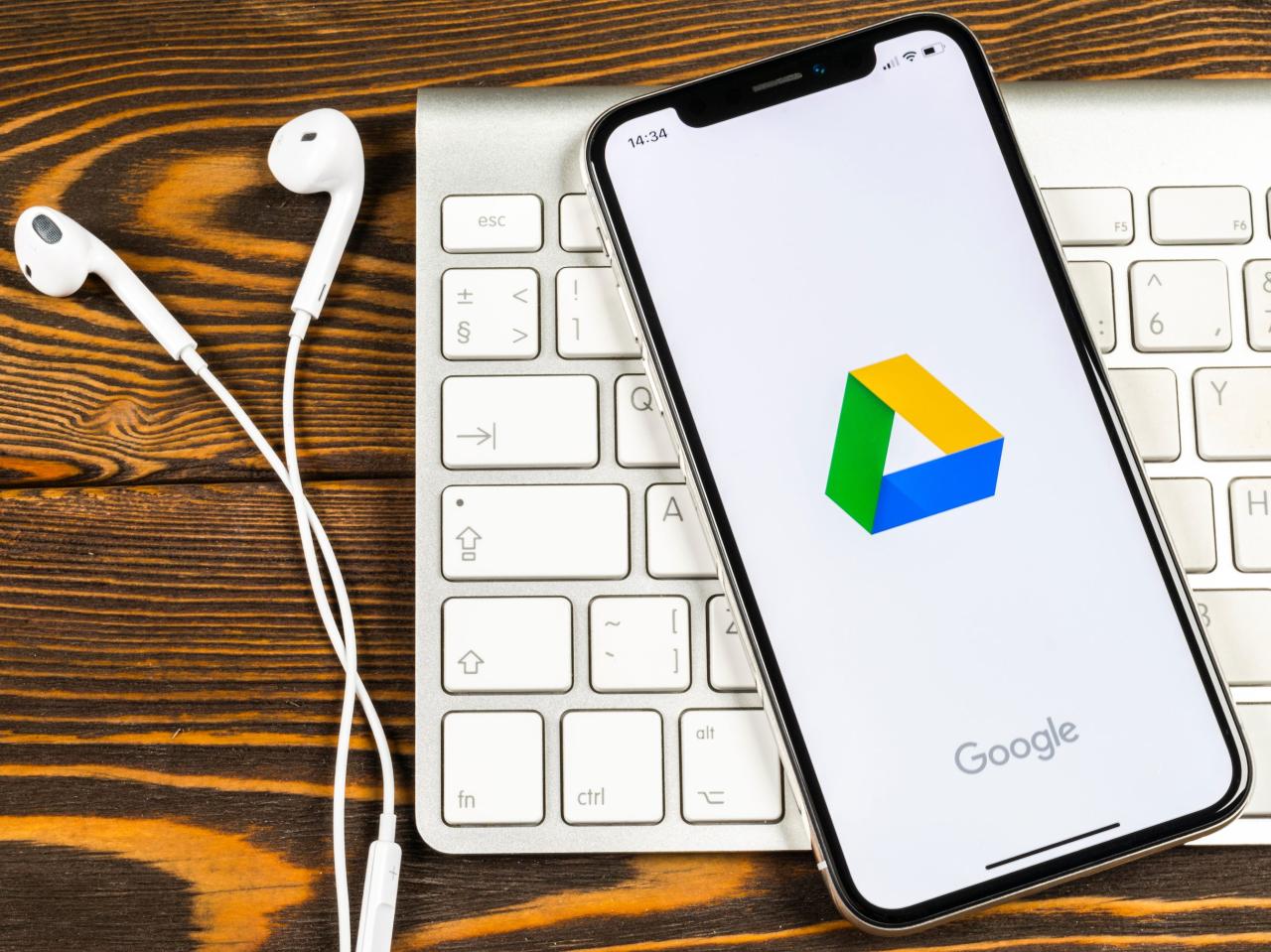 Cara download foto di google drive iphone