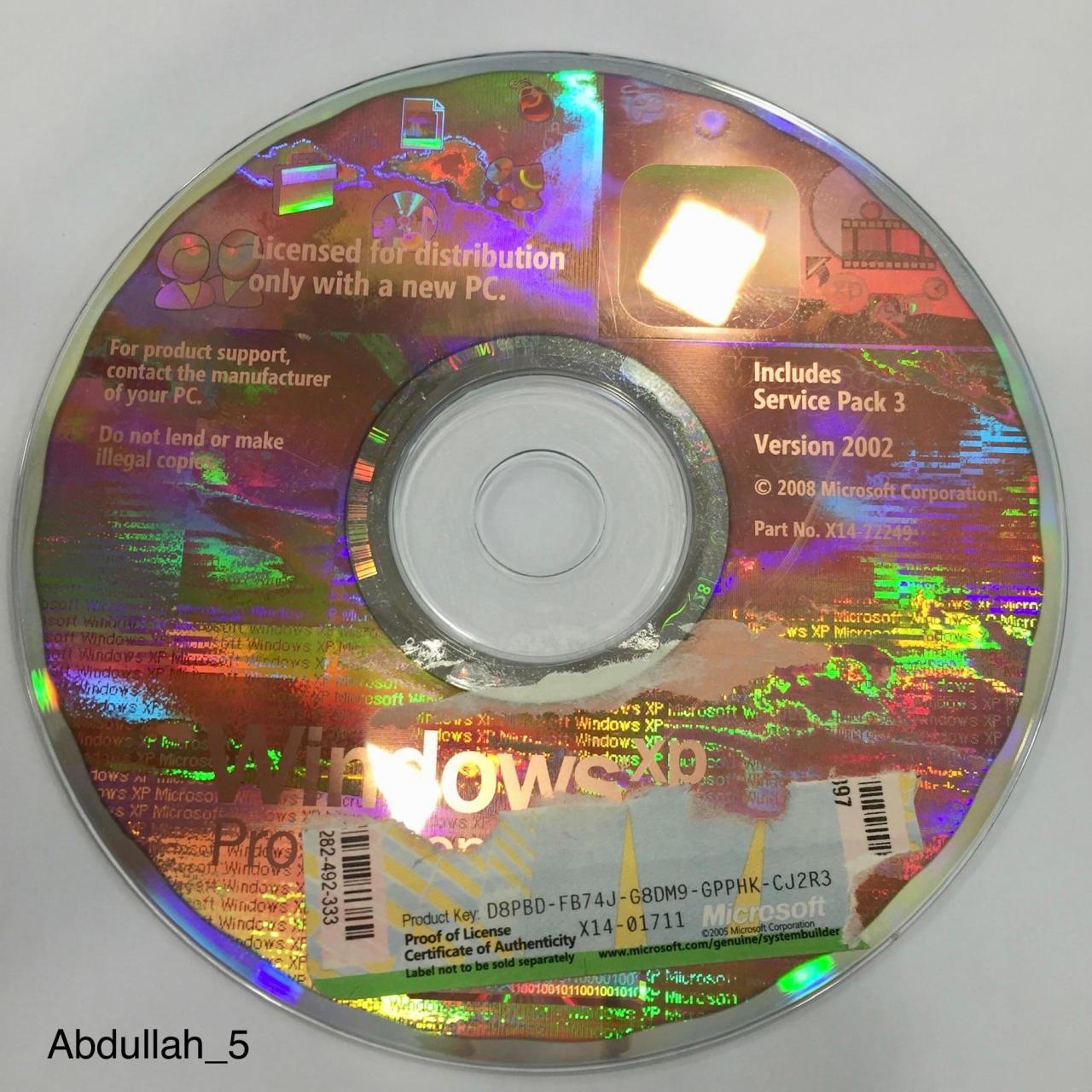 Cara instal ulang windows xp dengan cd